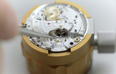 萧邦这个表日历怎么调的